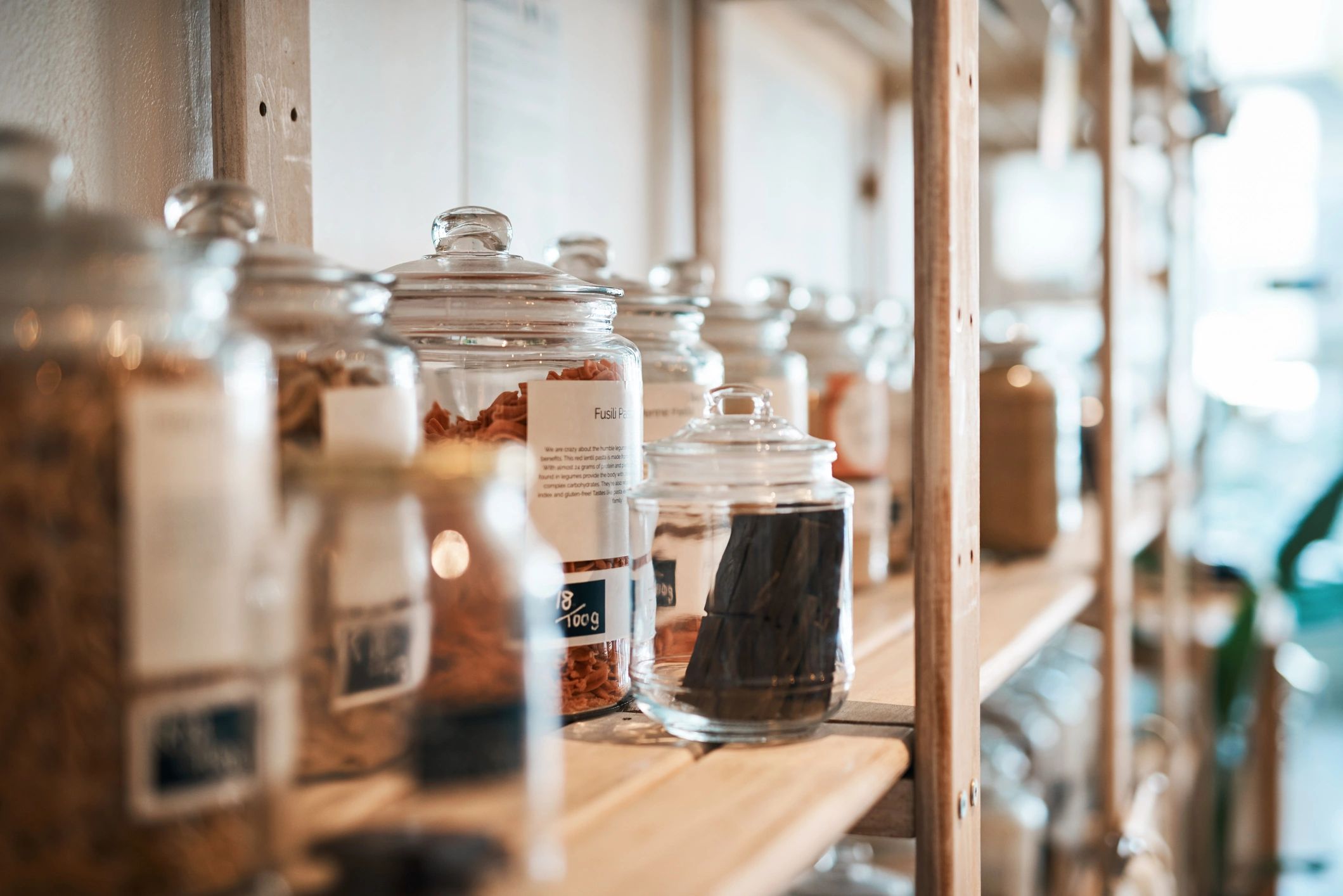 Product jars arranged on retail shelves